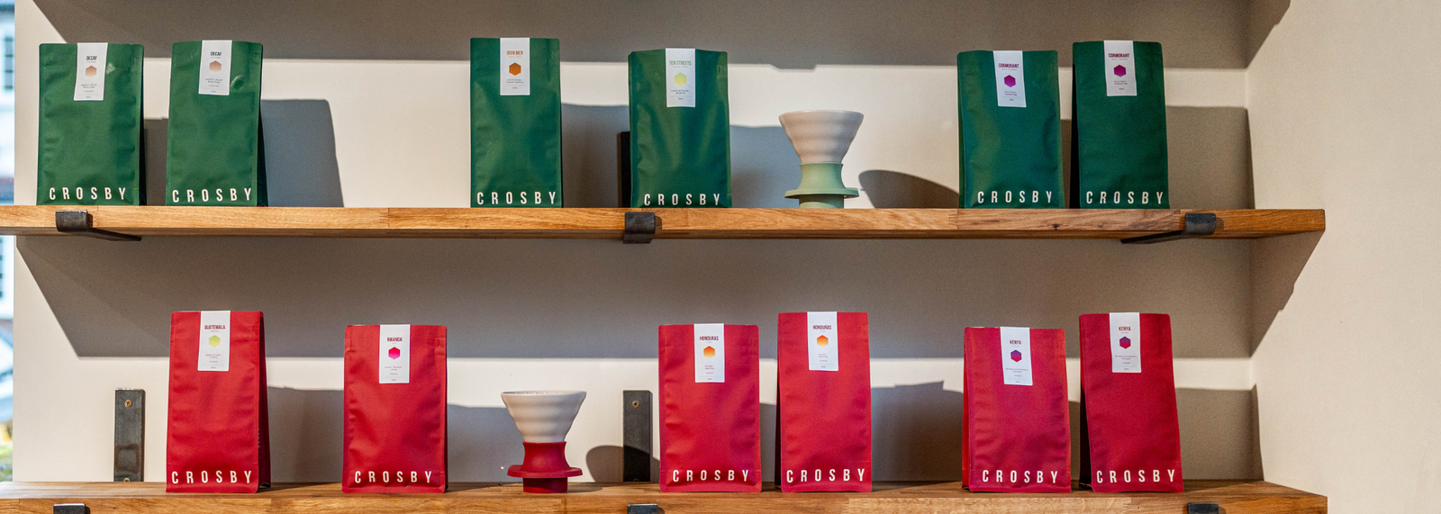 An image of a woman drinking Crosby Coffees arabica coffee blend